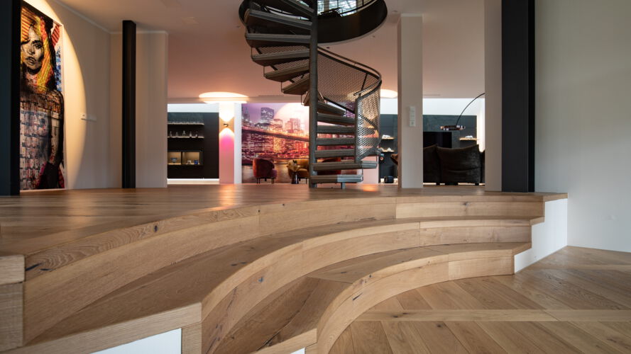 Spiral staircase inside with wooden floor around it